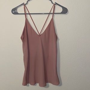 Pink formal spaghetti strap v neck top. Straps are cross from the back.